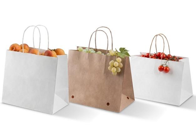 So sánh chất liệu Kraft và giấy trắng cao cấp.